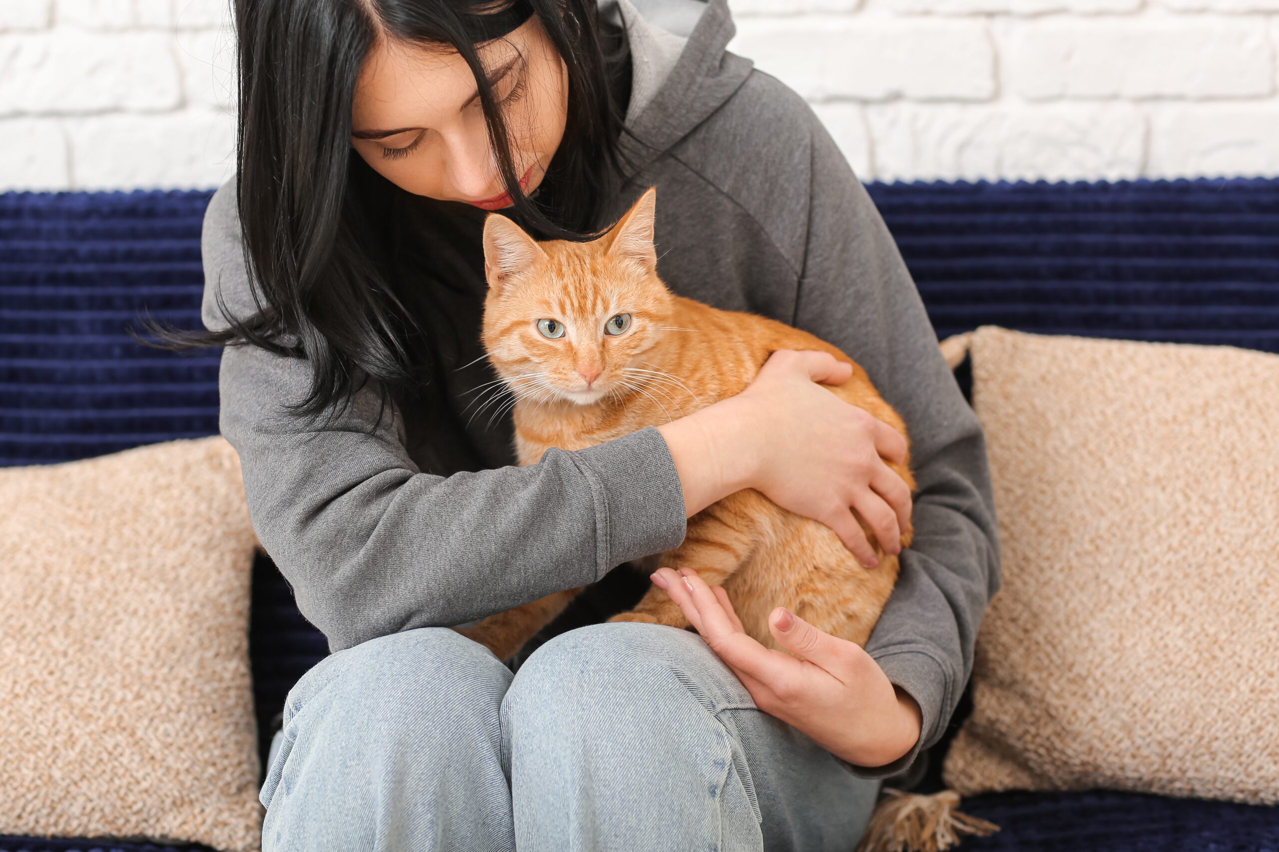 a woman sitting with her emotional support animal in Kentucky.