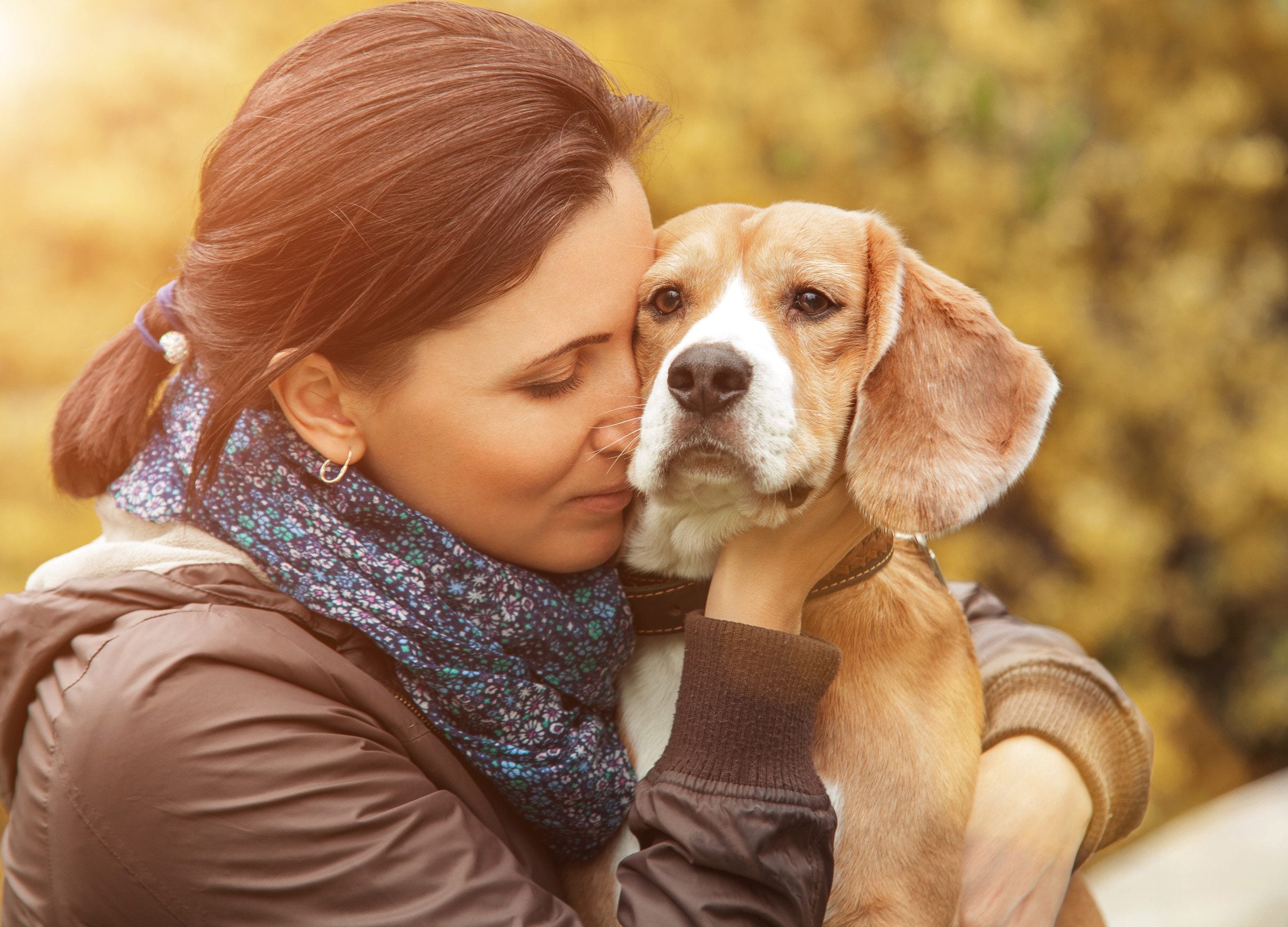 A woman hugging her emotional support animal (ESA) in Tampa, FL.